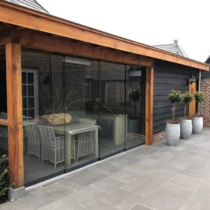 Glazen Schuifpui in tuin glaszetter den haag